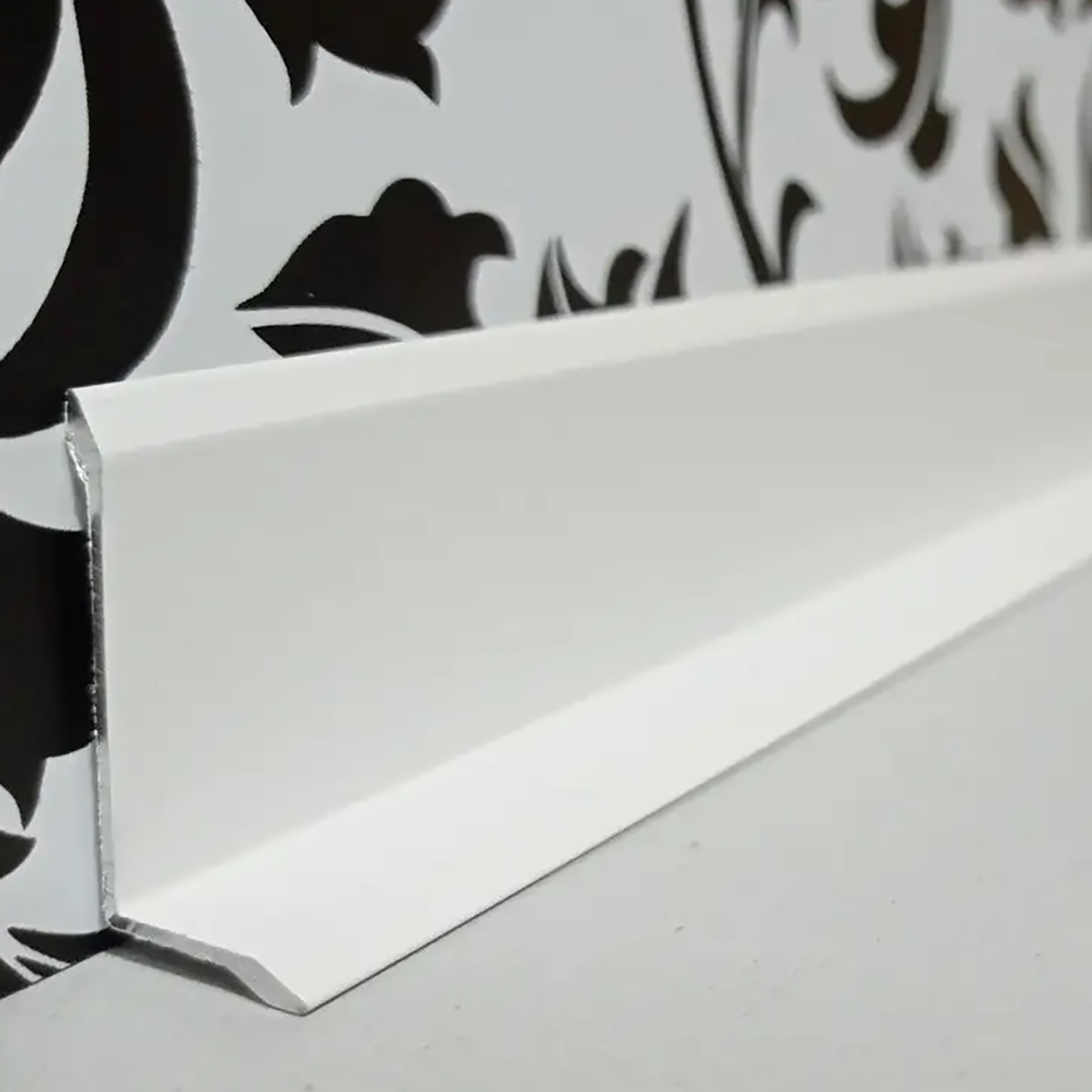 Накладной L-образный плинтус DEAL 6/25 DEAL 6 Білий